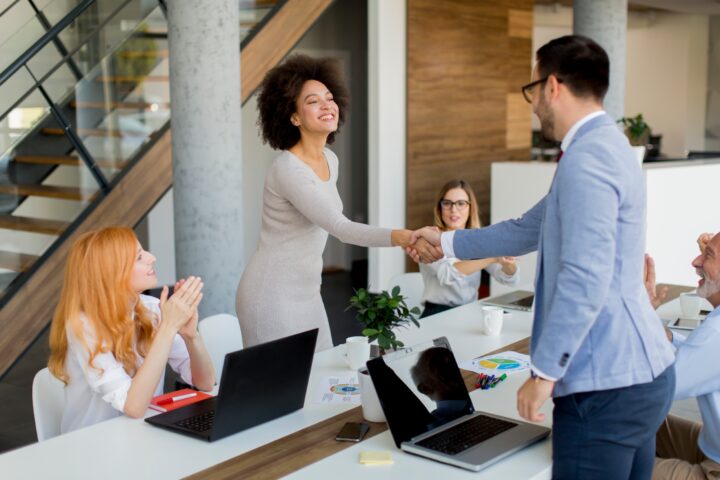 sales recruiters shaking hands